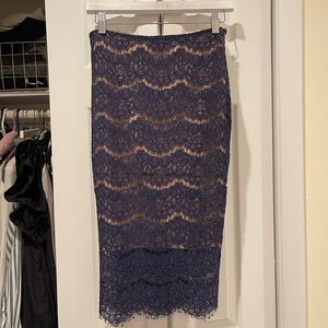 Navy lace with nude pencil skirt underneath